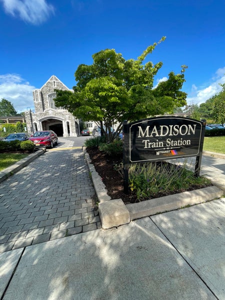 Madison Borough train station with sign